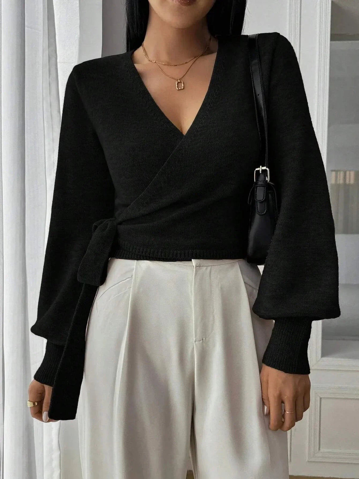 Black tie-waist wrap knit top